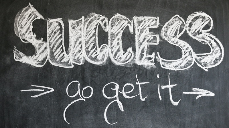"Success go get it" written on a black board with chalk