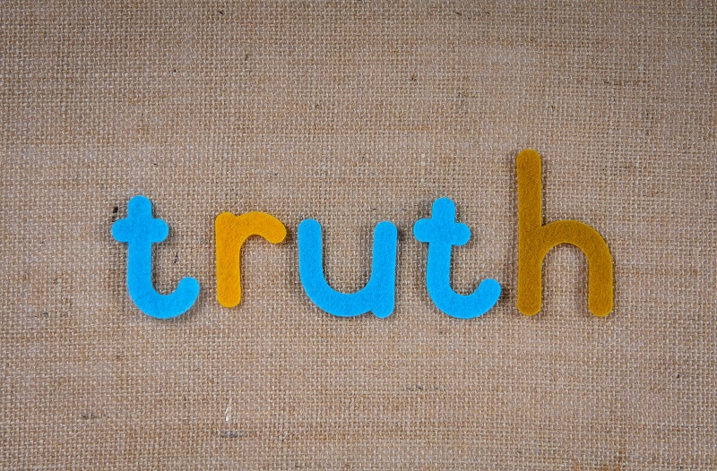 Can We Stop Lying All The Time? - An image showing the following knitted word: "truth"