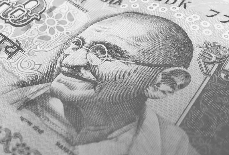 Can We Stop Lying All The Time? - A black and white image showing Mahatma Gandhi on an Indian currency note.