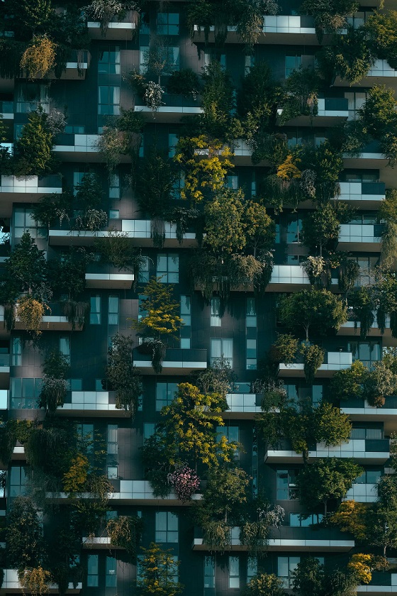 A building complex with plants all over it as a metaphor to ethical investing