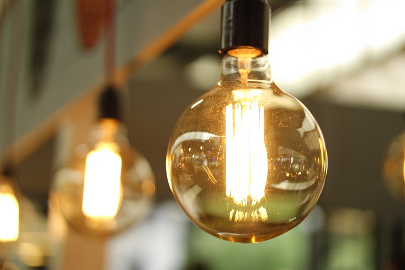 A light bulb - as metaphor for the topic: Optimize Energy Consumption