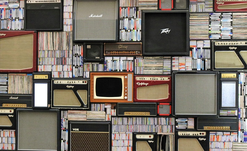 Patterns and randomness - a room full of ordered text books, radios, and televisions - to illustrate why certain songs make you feel emotional