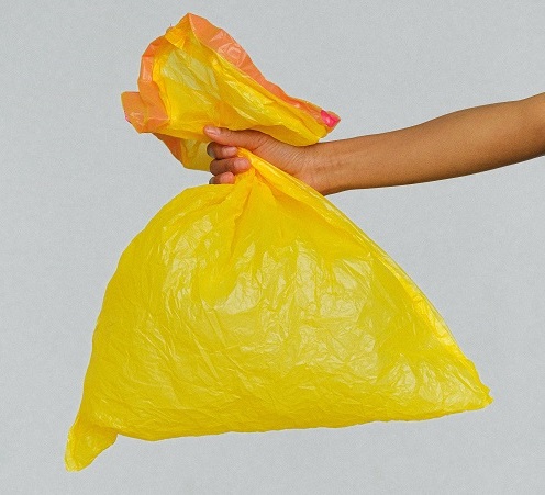 A picture of plastic bags held by hand