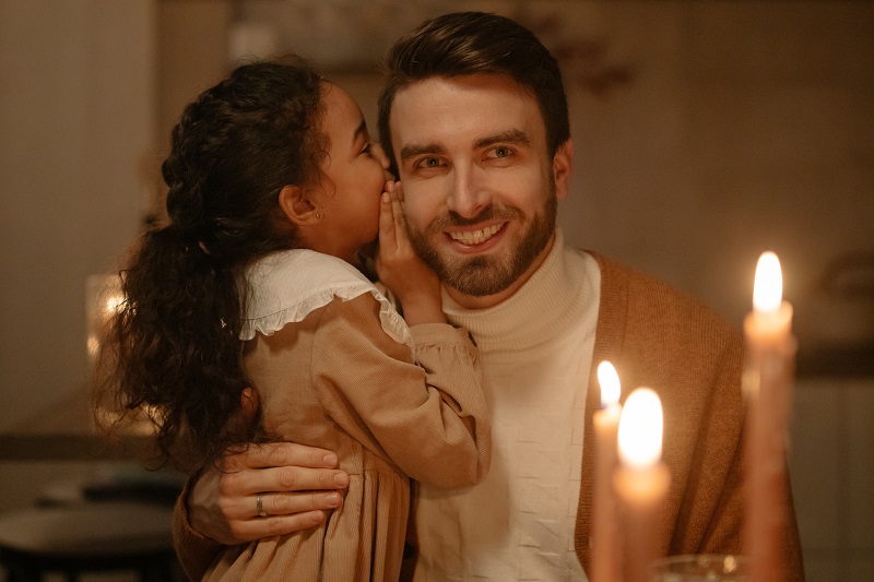 A child whispering to a man - to illustrate what happens when you whisper