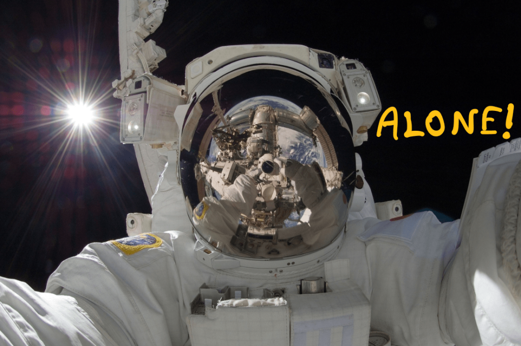3 Reasons Why Deep Space Travel Is Really Challenging - An image of a lonely astronaut taking a selfie in space with a star behind him. On his visor, one can see reflections of what appears to be a space station. On the empty space beside the astronaut, the following seems to be hand-written: "ALONE!"